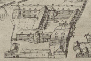 Eine handgezeichnete Stadtansicht mit mehreren Gebäuden, die um ein Haus herum angeordnet sind, auf Papier mit zusätzlichem handgeschriebenem Text.