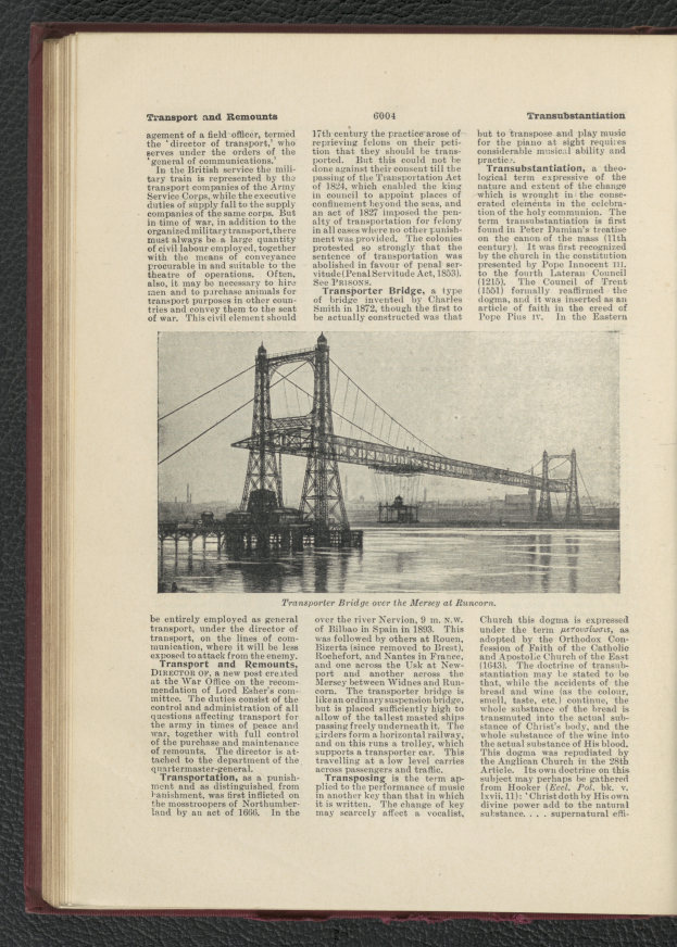 Ein aufgeschlagenes Buch mit einem Bild einer Hängebrücke mit mehreren Türmen und Seilen, begleitet von Text.