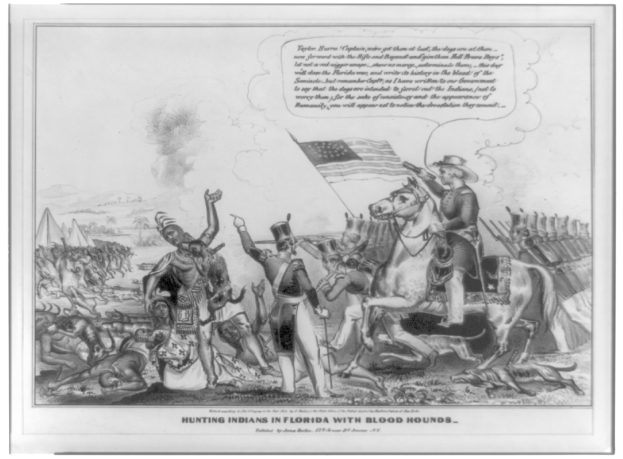 Schwarzes und weißes Foto einer Gruppe von Menschen, einige zu Pferde, mit einer Flagge im Hintergrund und Text unten mit der Aufschrift "Jagen von Indianern in Florida mit Bluthunden".