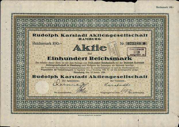 Eine alte deutsche Banknote mit einem schwarzen Hintergrund und der Aufschrift "Rudolph Karlstadt Aktiengesellschaft Hamburg" darauf.