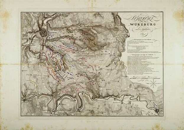 Ausführliche alte Karte von Würzburg, Deutschland, zeigt Straßen, Gebäude und Sehenswürdigkeiten mit begleitendem Text über Bevölkerung, Straßen und bemerkenswerte Merkmale.